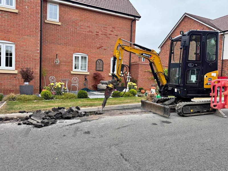 Precision roadway breaking by Enzoroy Construction in action – Expert demolition